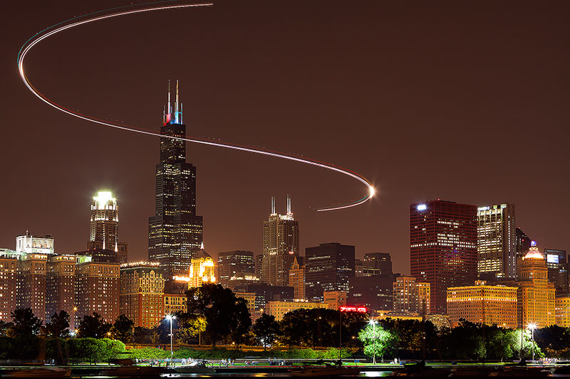 america,chicago,city scape,cityscape,helicopter,helicopter trail,horizontal,il,illinois,light trail,midwest,night,north america,sears tower,s