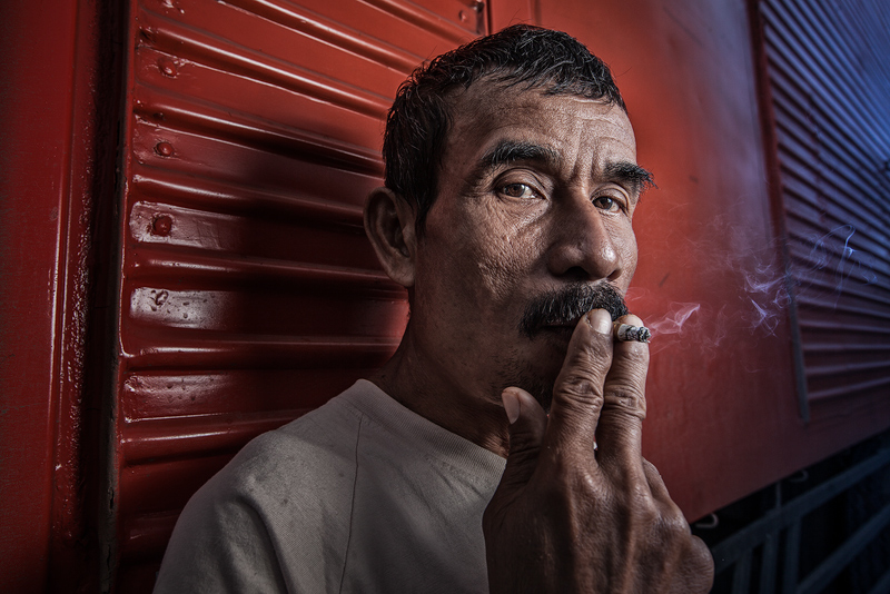 asia,asian,boat,dock,dock worker,environmental portait,indonesia,indonesian,jakarta,java,portrait,ship,smoking,sunda kelapa,west java