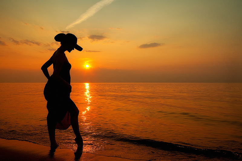 america,beach,dress,female,hat,horizontal,indiana,indiana dunes,lake michigan,midwest,north america,sand,silhouette,sunset,united states,us,usa,woman