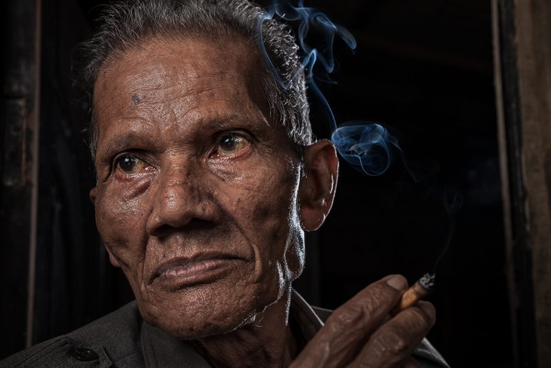 asia,asian,environmental portait,indonesia,indonesian,jakarta,java,male,man,old,portrait,rumpin,smoking,west java