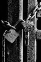 Old lock and chain along Chicago's riverwalk.