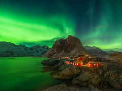 An amazing northern lights show at a classic location in Hamnoy, Norway.
