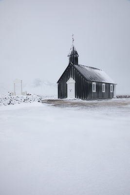 Iceland's famous black church after a severe Winter storm.