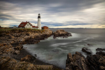 Maine's beautiful Portland Headlight lighthouse on a cloudy day.