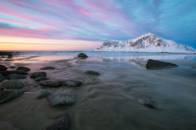 The final moments of sunset reflecting off of Skagsanden Beach.