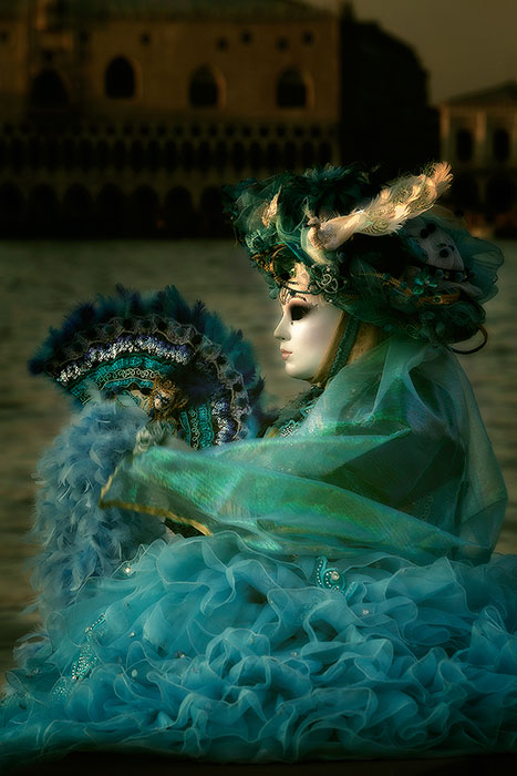 Carnival model reflecting on the shores of San Gorgio island