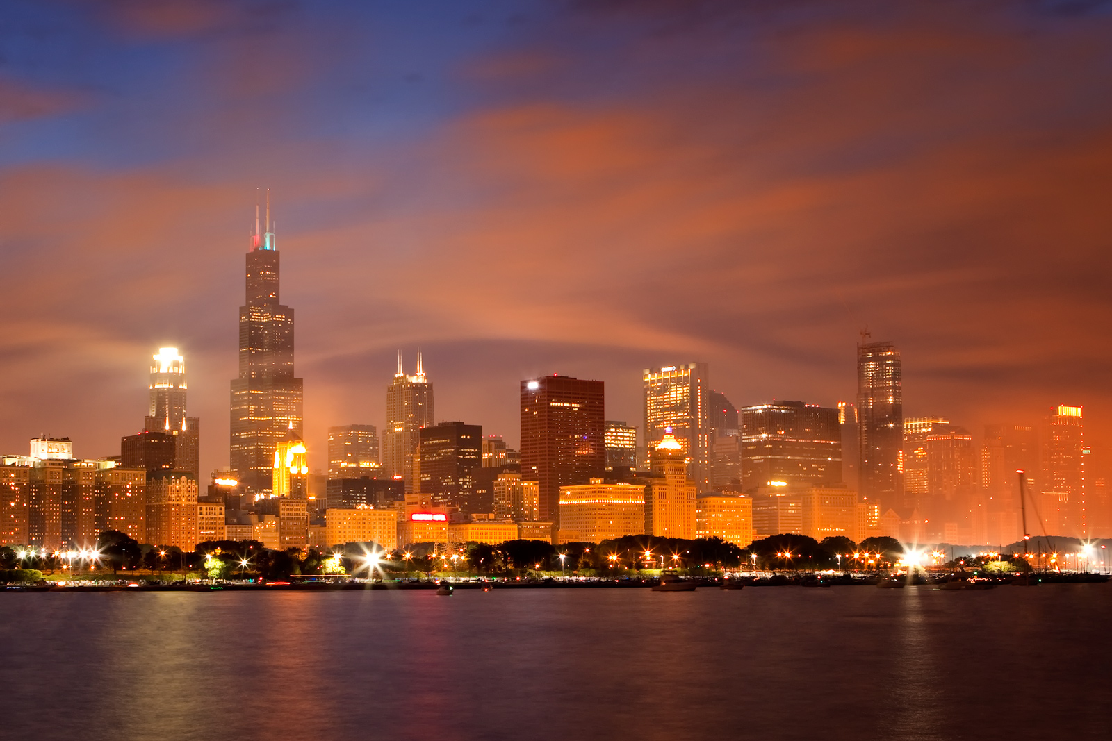 Smoke clearing over the skyline after a 4th of July fireworks celebration.