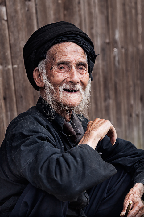 Portrait of smiling older Chinese man