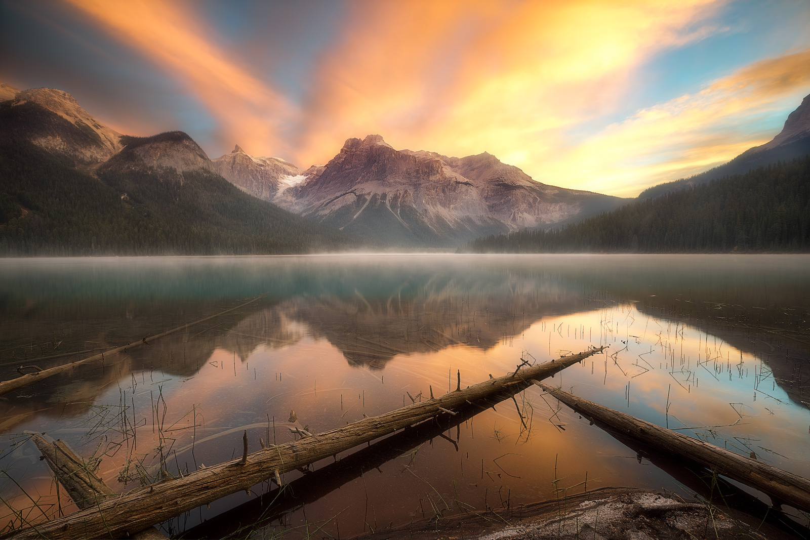 Brilliant colors tower over the mountains surrounding Emerald Lake.