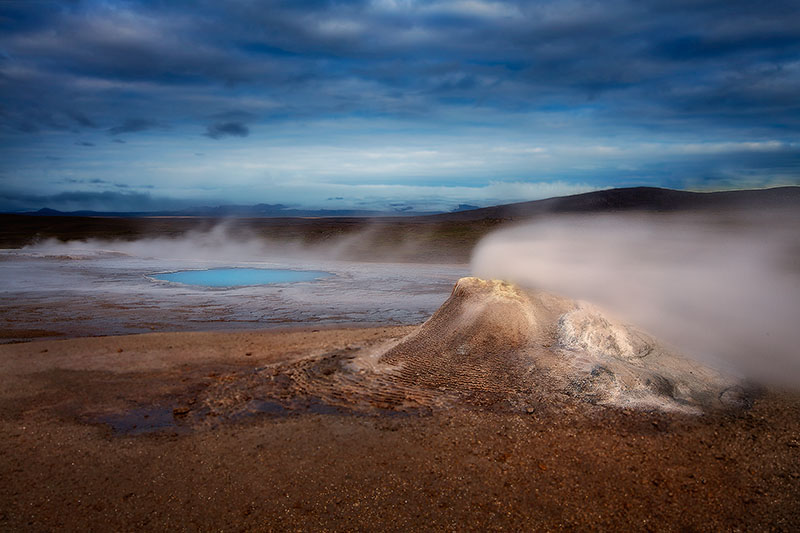 Active chimney and turqoise pool in a geothermal area of interior Iceland