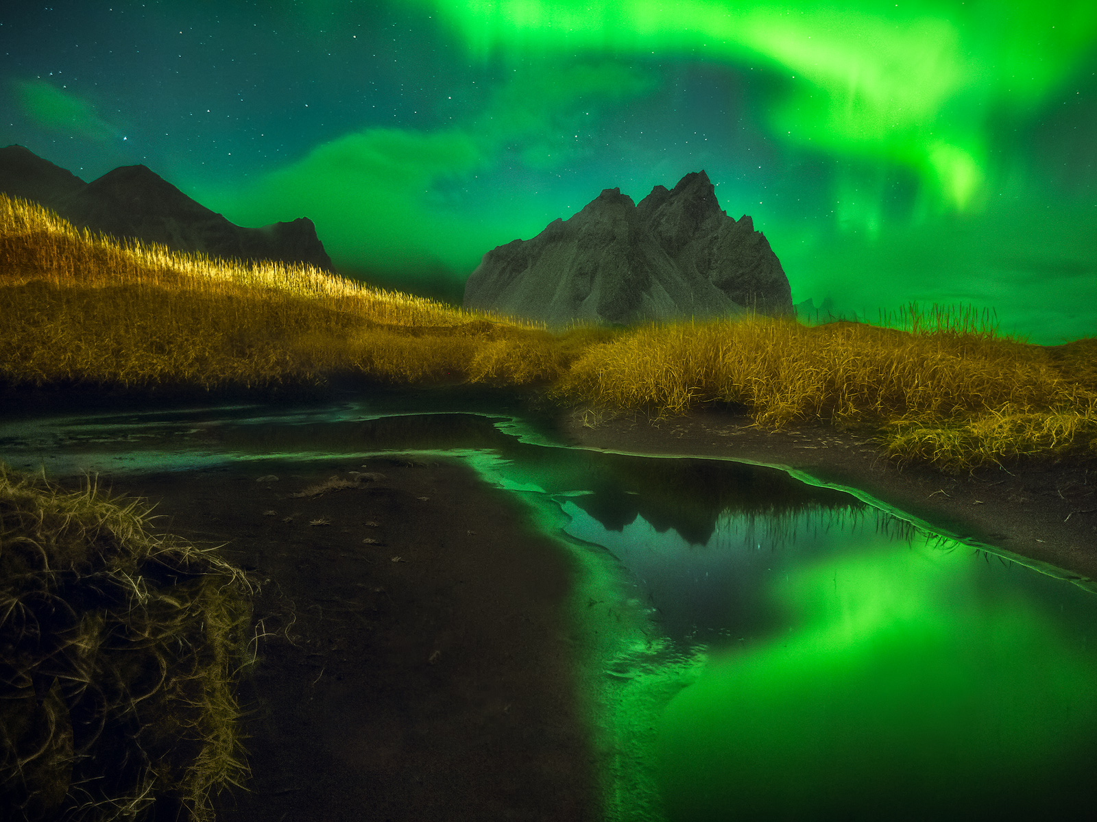 The Northern Lights illuminating the sky over southeastern Iceland.