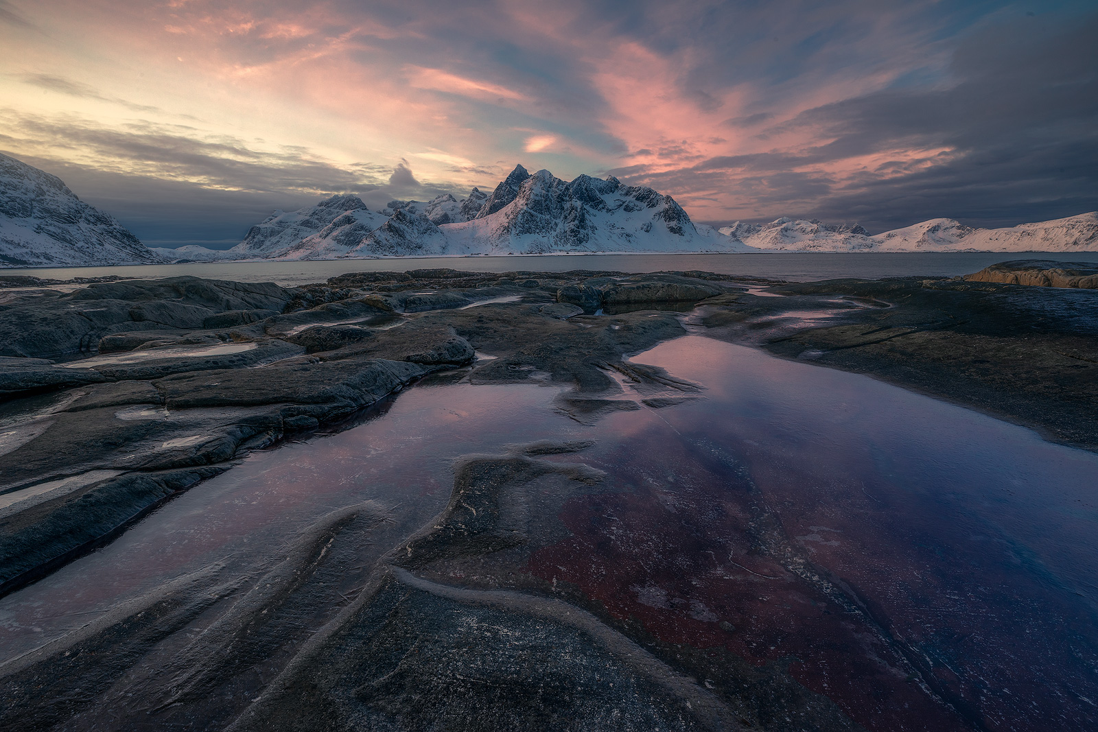 An all-around beautiful morning on the rocky shoreline in Norway.
