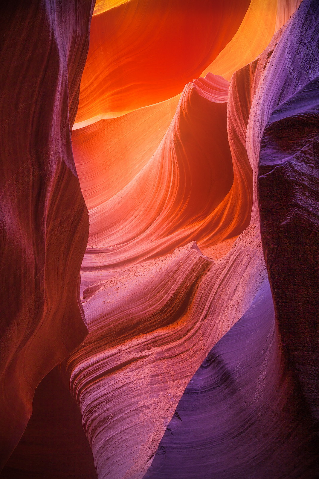 Beautifully shaped rock with color variety inside a slot canyon.