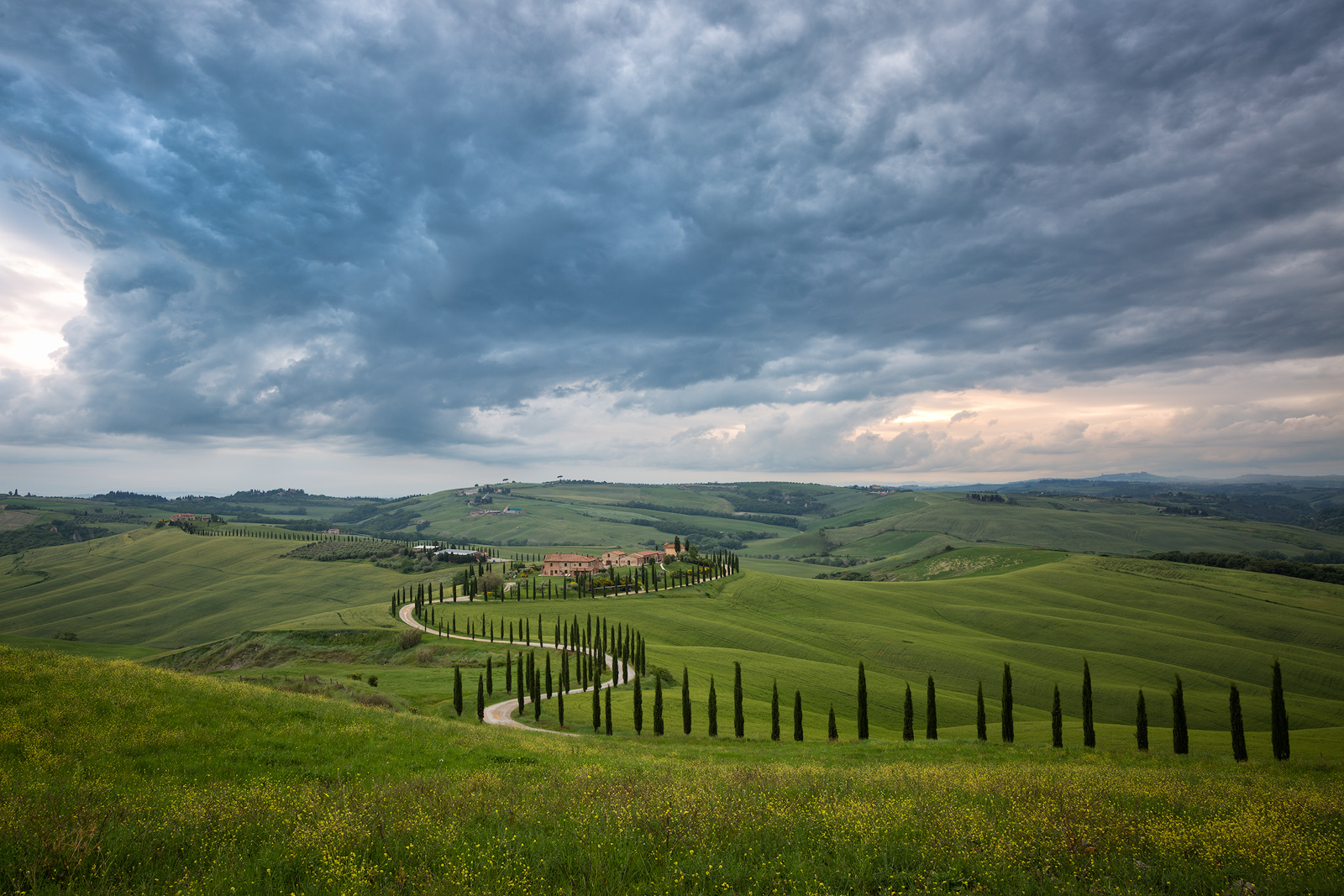 Distant storm clouds moving over the hills of Tuscany.
