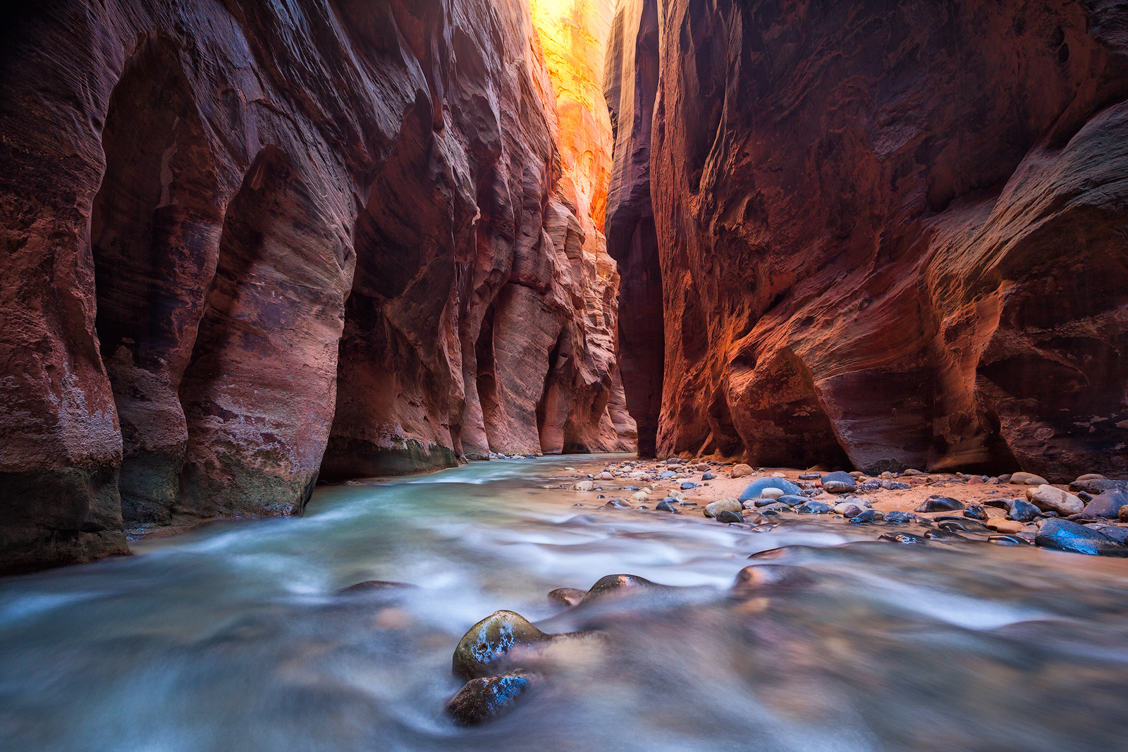 A river rushing into a canyon in Zion National Park's "The Narrows" A river rushing into a canyon in Zion National Park's "The...