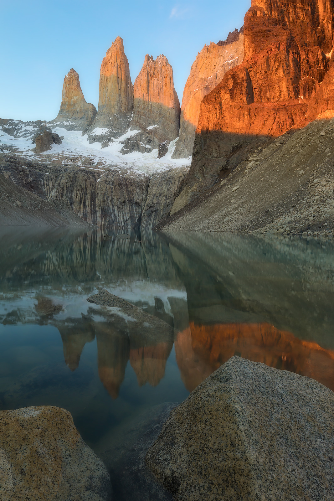 The incredible three towers of Torres del Paine National Park lit up by morning light.