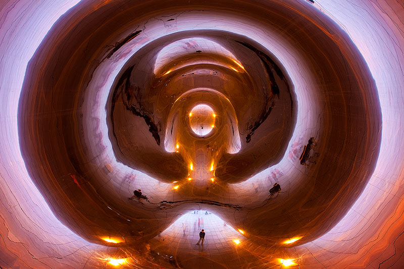 Photographer shooting from under the Bean